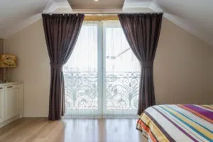 Superb big window with drape and curtain in modern home interior